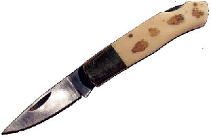 Складной нож. Орнамент - медвежьи следы  